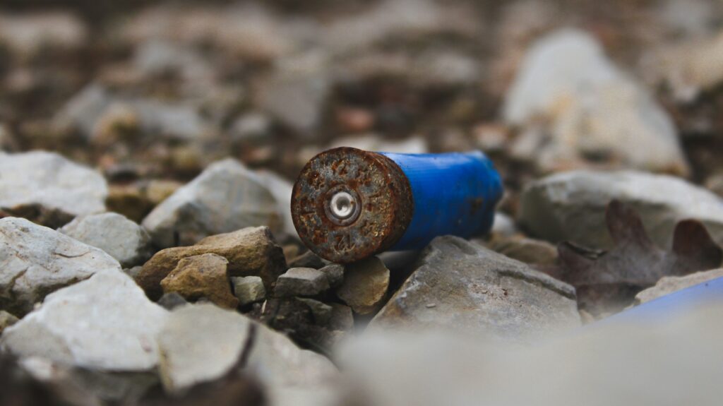 Cartridge cases on the ground after hunting, environment